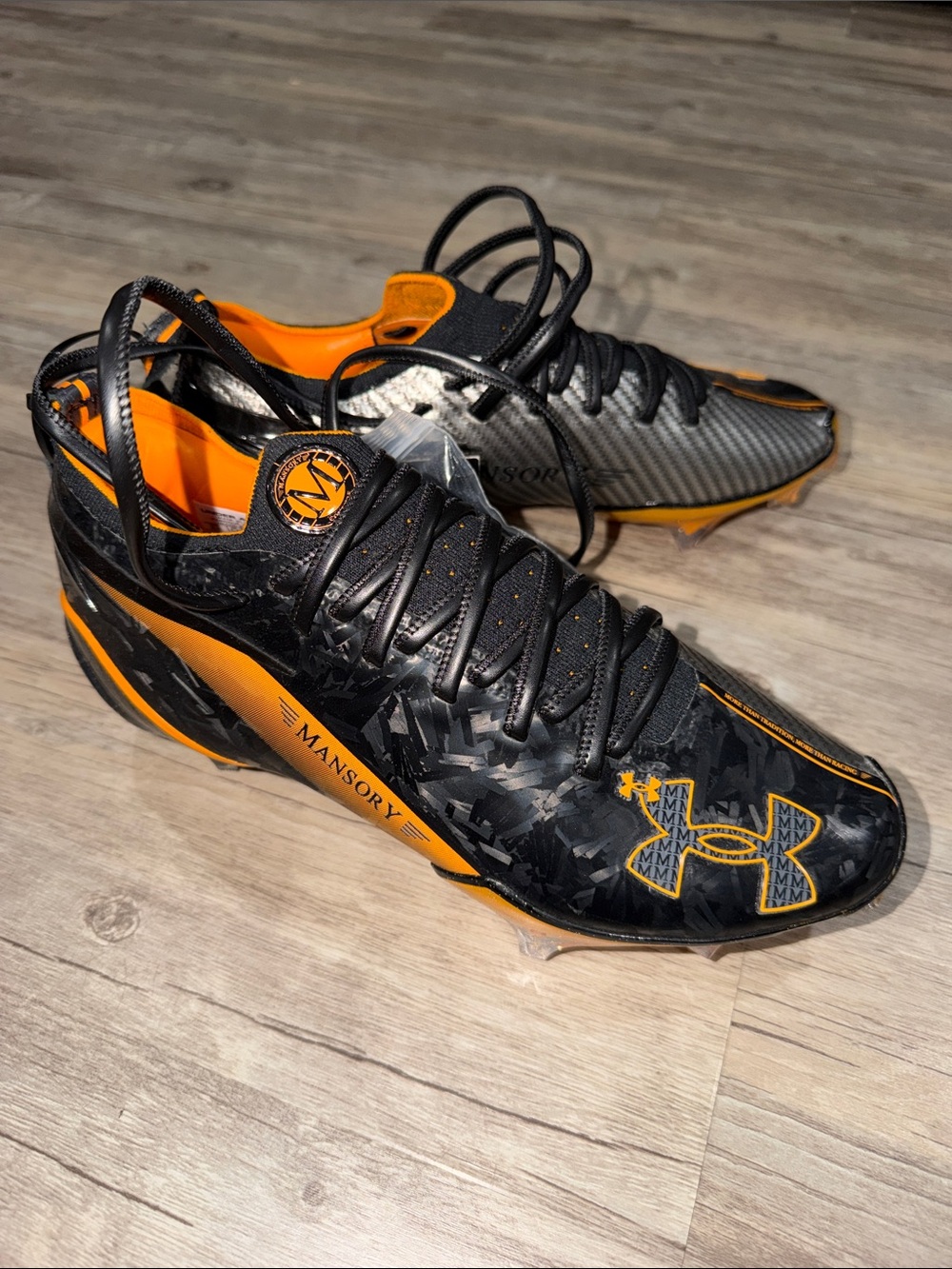 Under Armour Men’s Black & Orange Athletic Cleats - Mansory